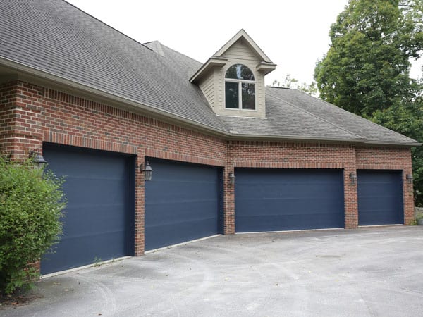 After painting garage doors a beautiful gray-blue