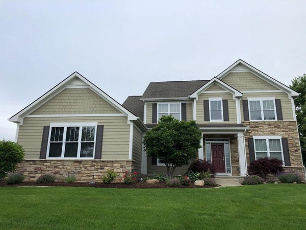 Before painting a house exterior front in dexter Michigan