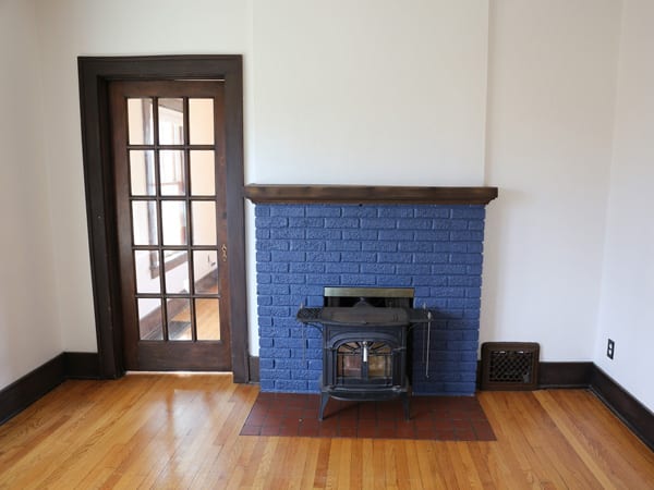 Before painting wood trim white and brick fireplace white