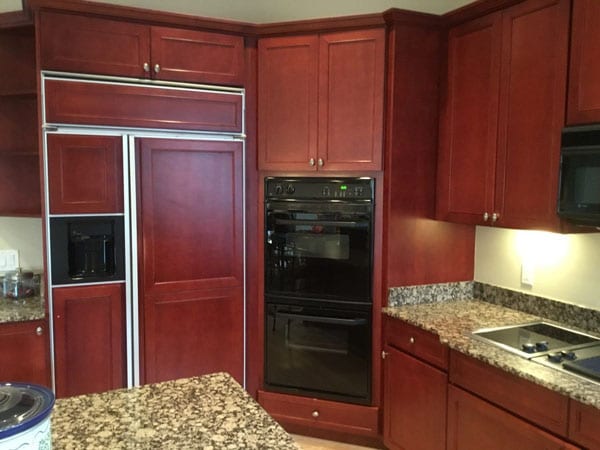 Closeup of kitchen cabinets before painting