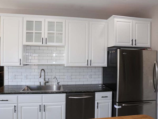 Glossy paint sheen used for white kitchen cabinets
