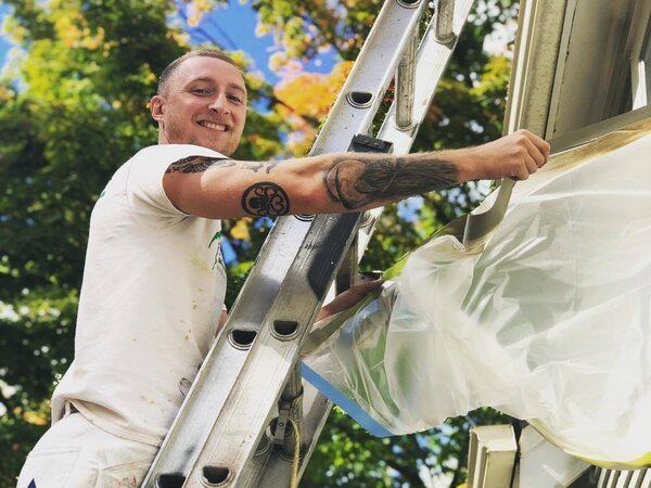 team member painting