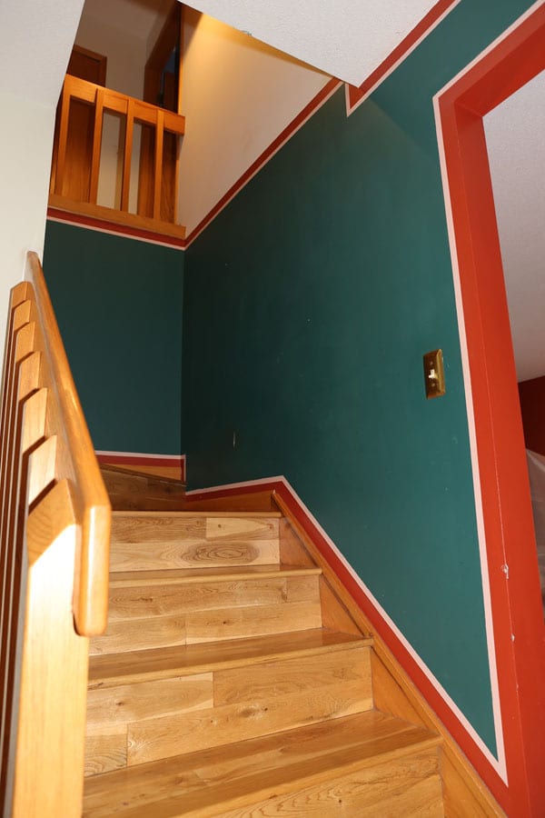 Stairwell before repainting walls