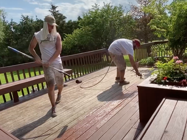Tribble team staining decking