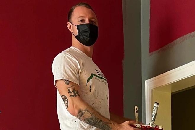 A Tribble Painting Company painter working their artistry
