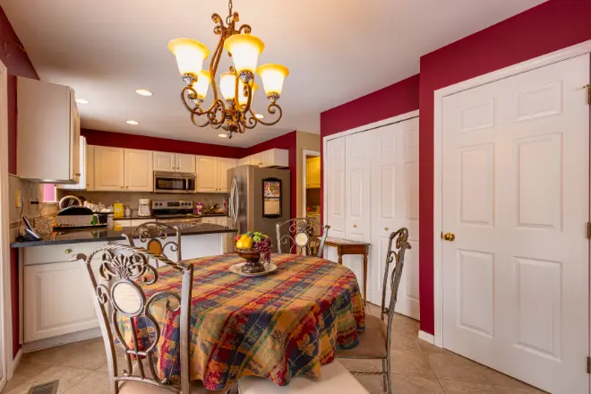 A kitchen and dining area painted by Tribble Painting Company