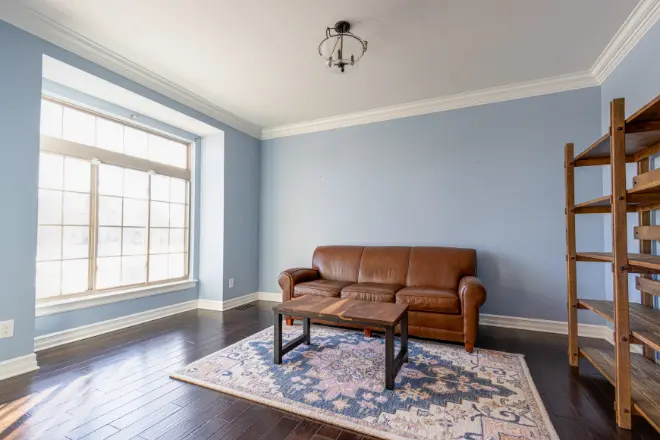 A living room painted by Tribble Painting Company - Aura vs. Regal Select.