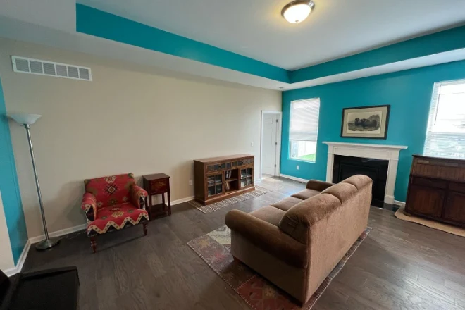 A bedroom painted with high quality blue paint.