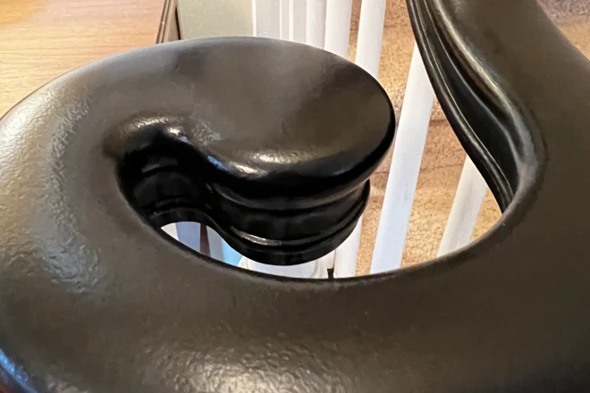 A staircase banister painted with high-traffic paint by Tribble Painting Company