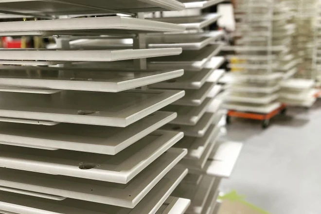 Cabinet doors drying on a rack