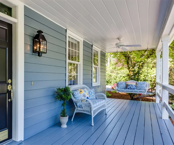Close up of the exterior of a home painted blue