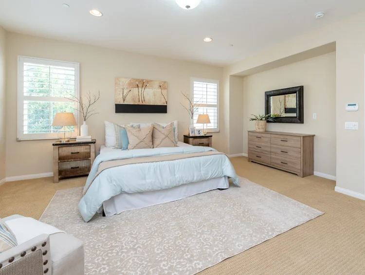 Fresh beige paint in a master bedroom
