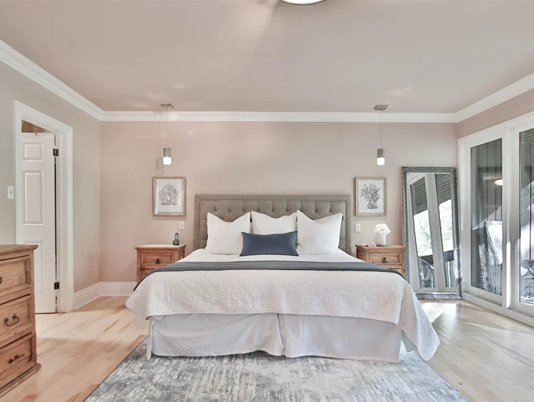 Interior of a bedroom painted grey beige