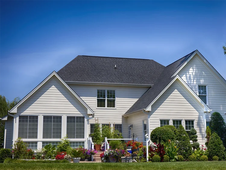 Exterior of the backside of a house painted off white