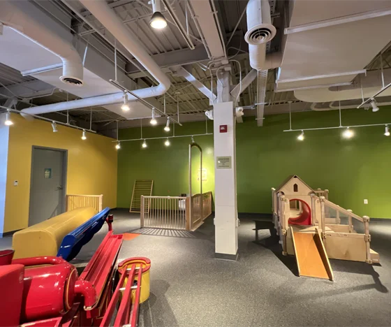 Childs play area painted green and yellow