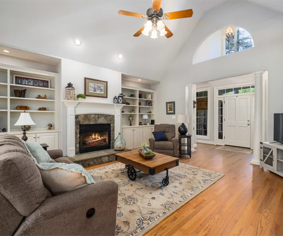 Living room interior with vaulted ceilings painted white