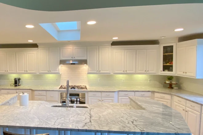 Professionally painted kitchen cabinets completed by the Tribble Painting Company.