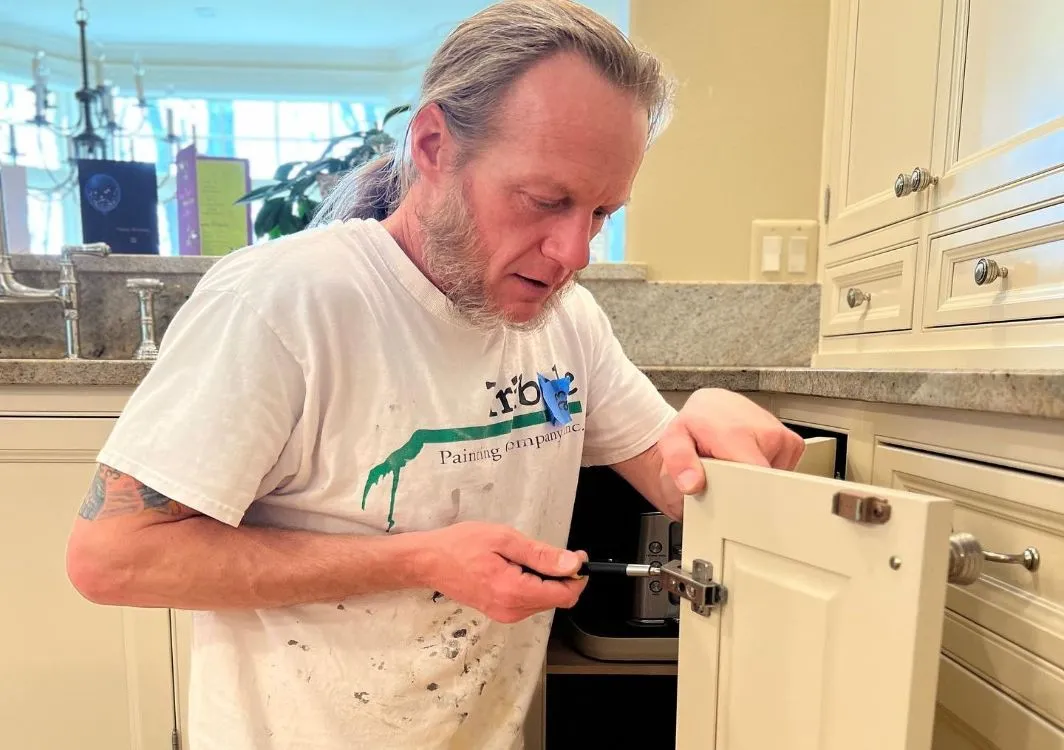 Reinstalling kitchen cabinet doors after painting