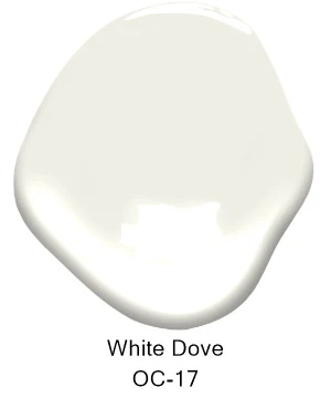 An off-white paint swatch labeled White Dove OC-17 with a smooth, glossy surface—ideal for interior painting projects by Tribble Painting in Southeast Michigan, serving areas like Ann Arbor, Ypsilanti, and Novi. by Tribble Painting