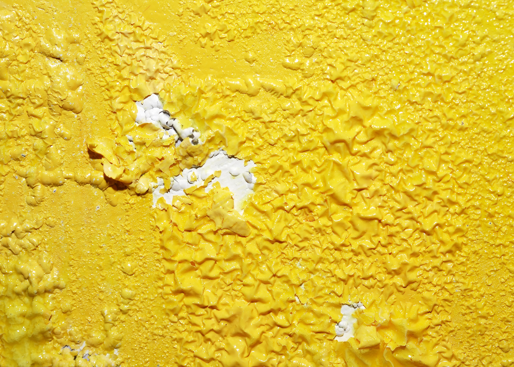 Yellow Paint being removed with chemicals